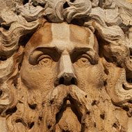 Carved bridge adornment